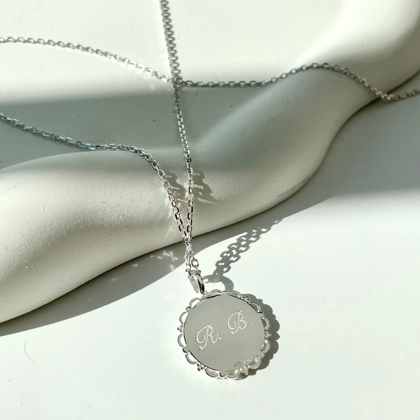 Le Collier Dentelé - Empreinte Digitale Chiffre